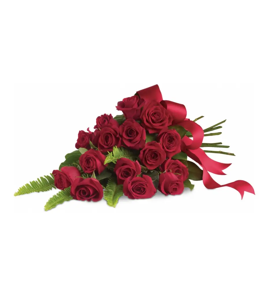 Lay-down spray of red roses tied with a long red satin ribbon