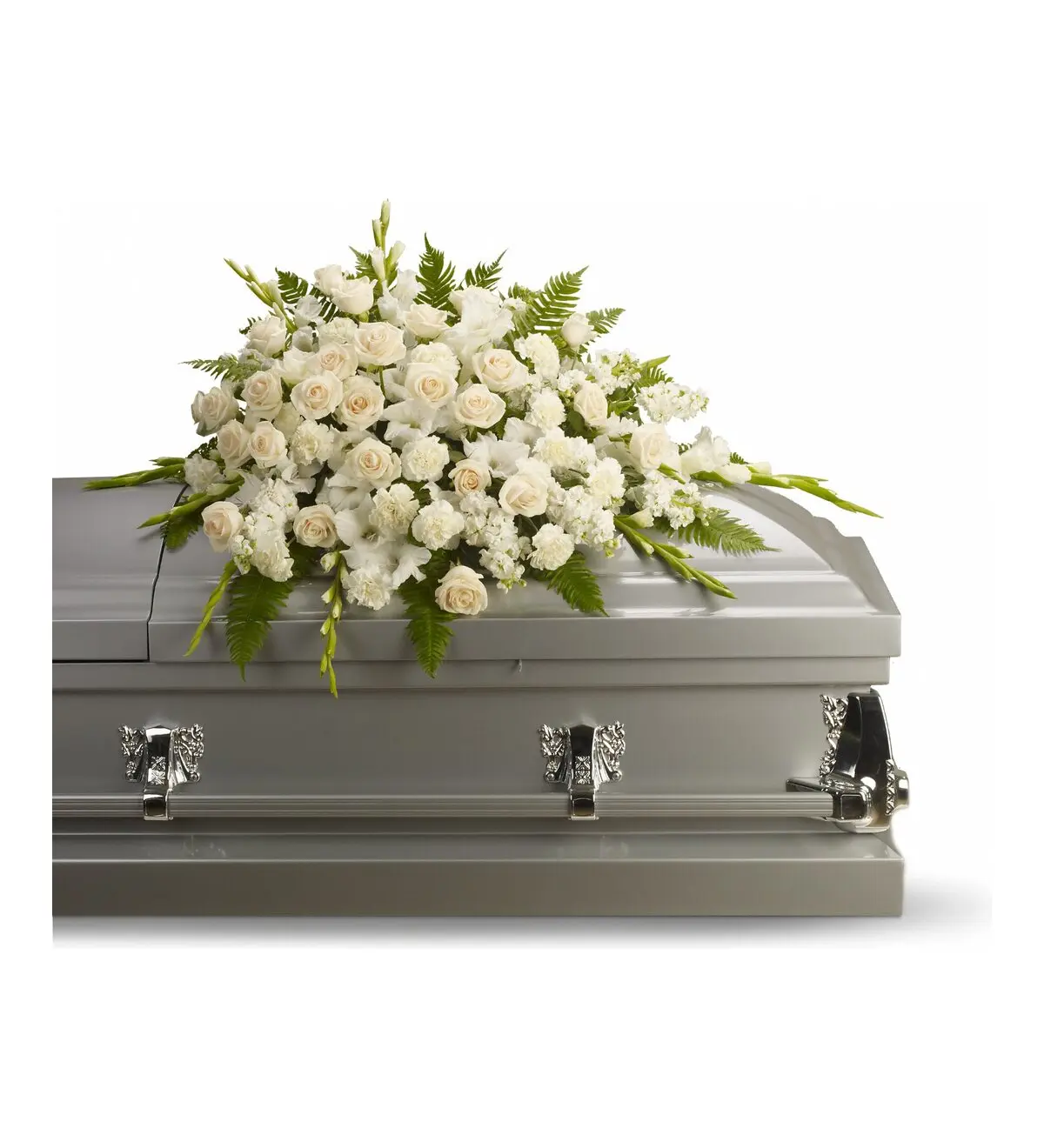 Cream and white half casket spray of roses and gladiolus on a silver casket