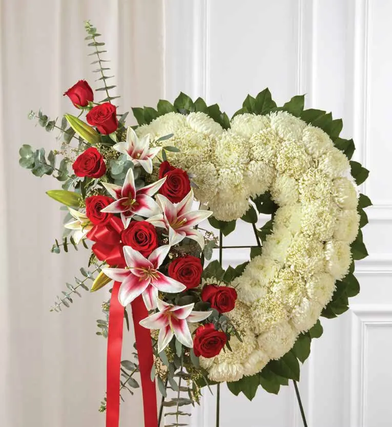 White mum heart with red roses and pink lilies on an easel