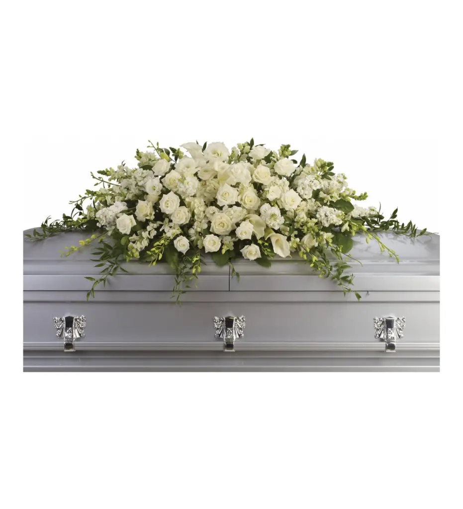 Full white rose and calla lily casket spray on a silver casket
