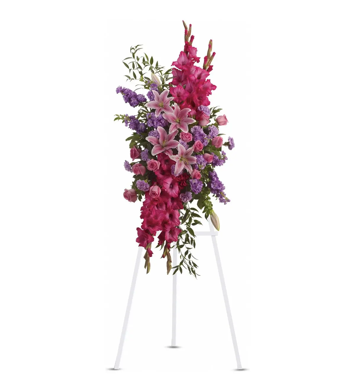Pink gladiolus, lilies and roses standing spray on a white easel